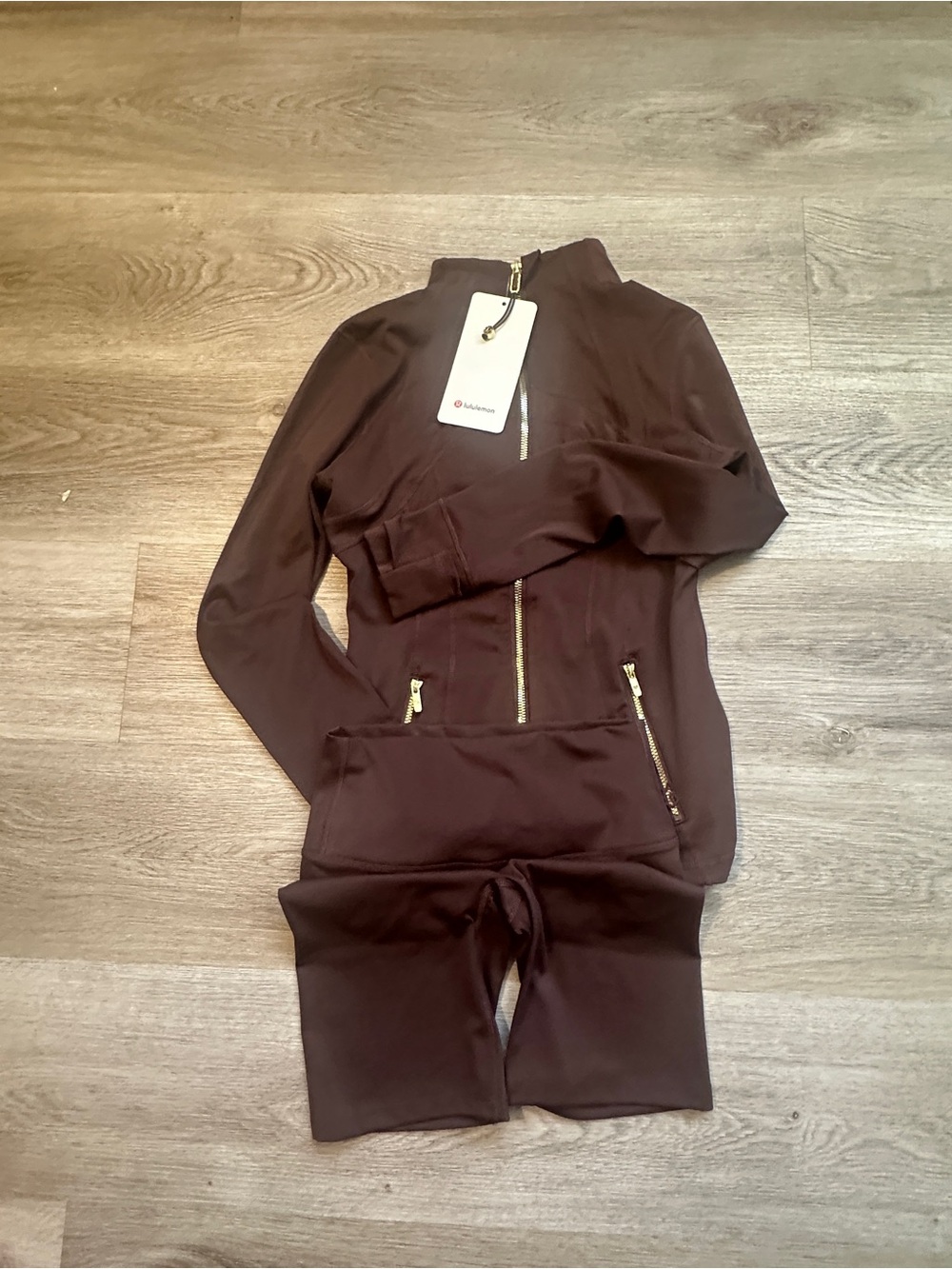 lululemon athletica Burgundy Zip-Front Jumpsuit with Gold Hardware